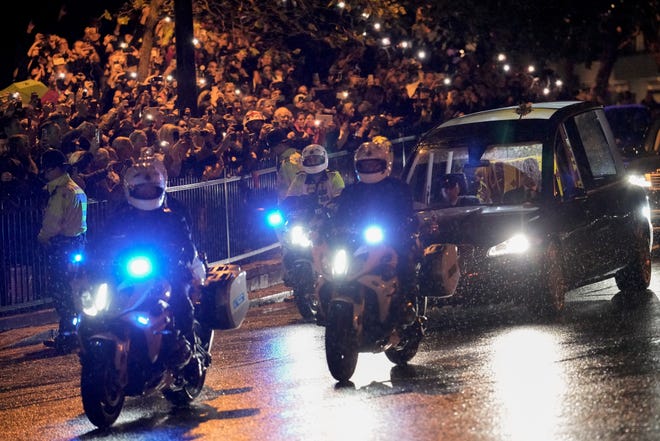 The cortege carrying the coffin of late Queen Elizabeth II, heads towards Buckingham Palace in London, Tuesday, Sept. 13, 2022. Britain's longest-reigning monarch who was a rock of stability across much of a turbulent century, died Thursday Sept. 8, 2022, after 70 years on the throne. She was 96.