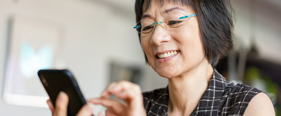 Woman on her mobile device checking her case status through her online account.