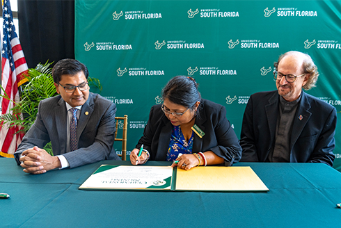 Amit Bose, administrator of the Federal Railroad Administration, Dean Sanjukta Bhanja, interim dean of the USF College of Engineering and Fred Mannering, executive director of CUTR