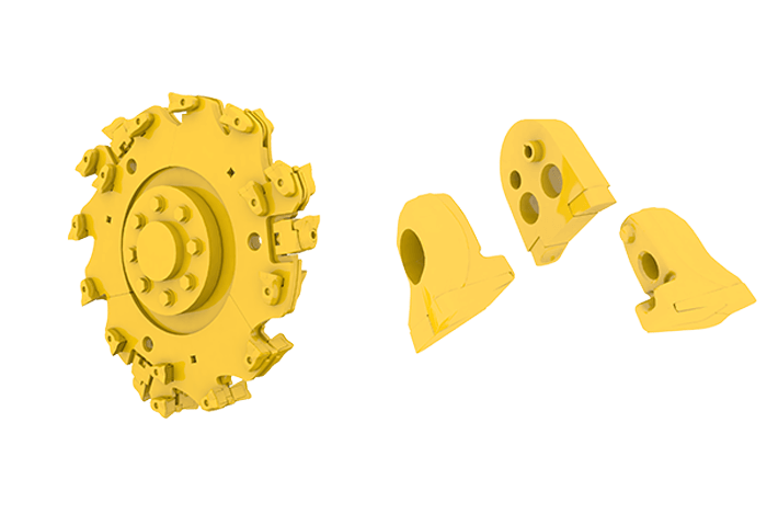 A cut out image of yellow pieces of the Vermeer cutting system for stump cutters