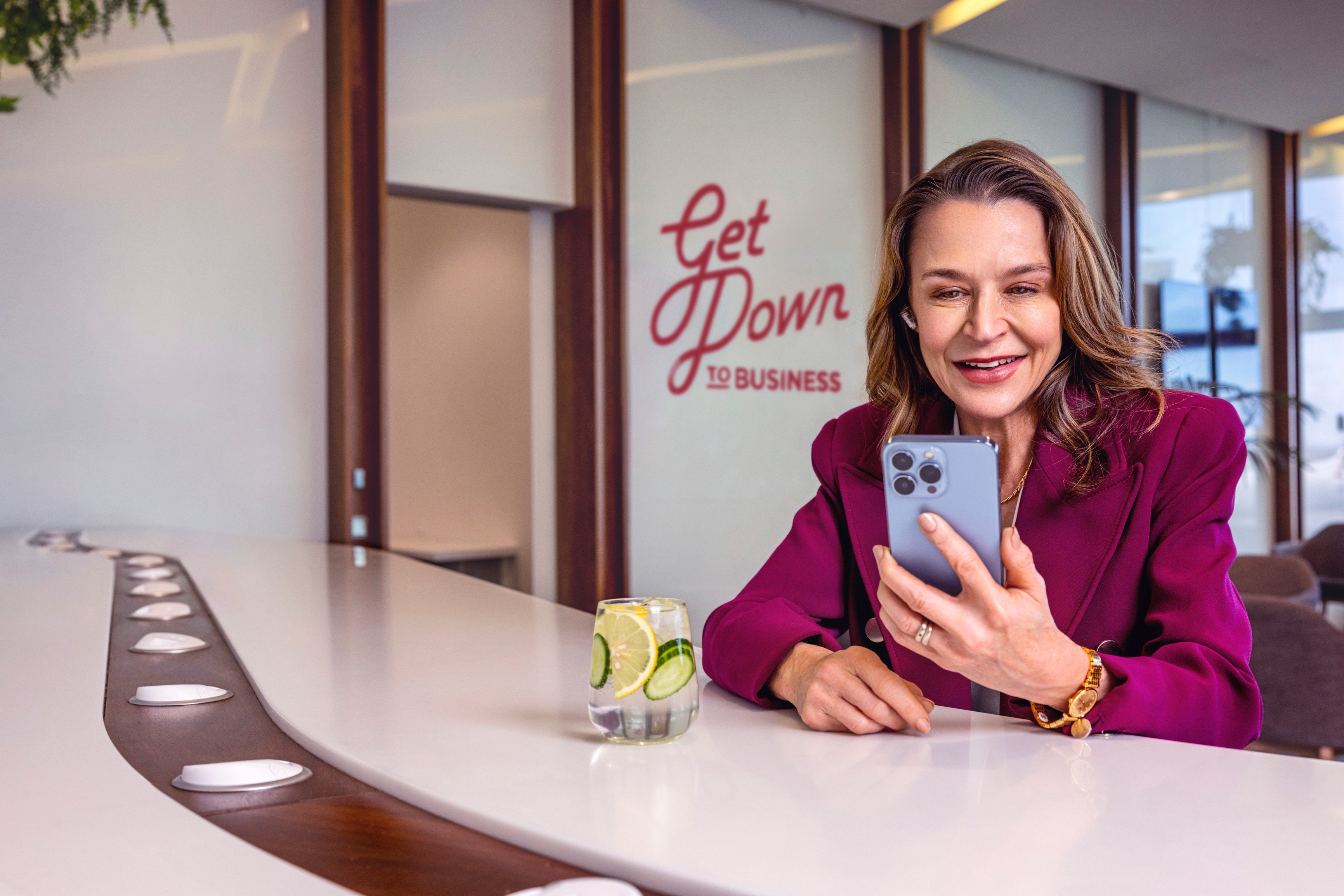 Businesswoman reading an email on her smartphone