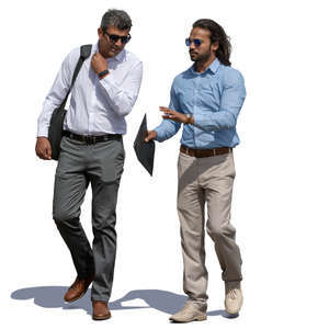 two businessmen walking and talking