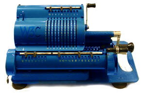 [Picture: a mechanical calculator bearing a W3C logo]