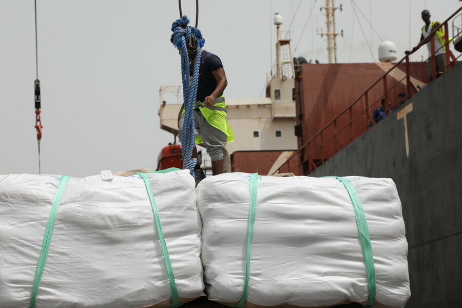 Port workers in Aden offload WFP rice donated by Korea. Yemen once produced most of its food; now it imports almost all of it. Hebatallah Munassar