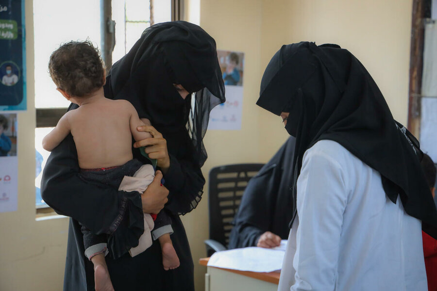 In Yemen's southern city of Taiz, 11-month-old Ameer Hellal receives WFP supplementary food to treat malnutrition. Photo: WFP/Albaraa Mansoor