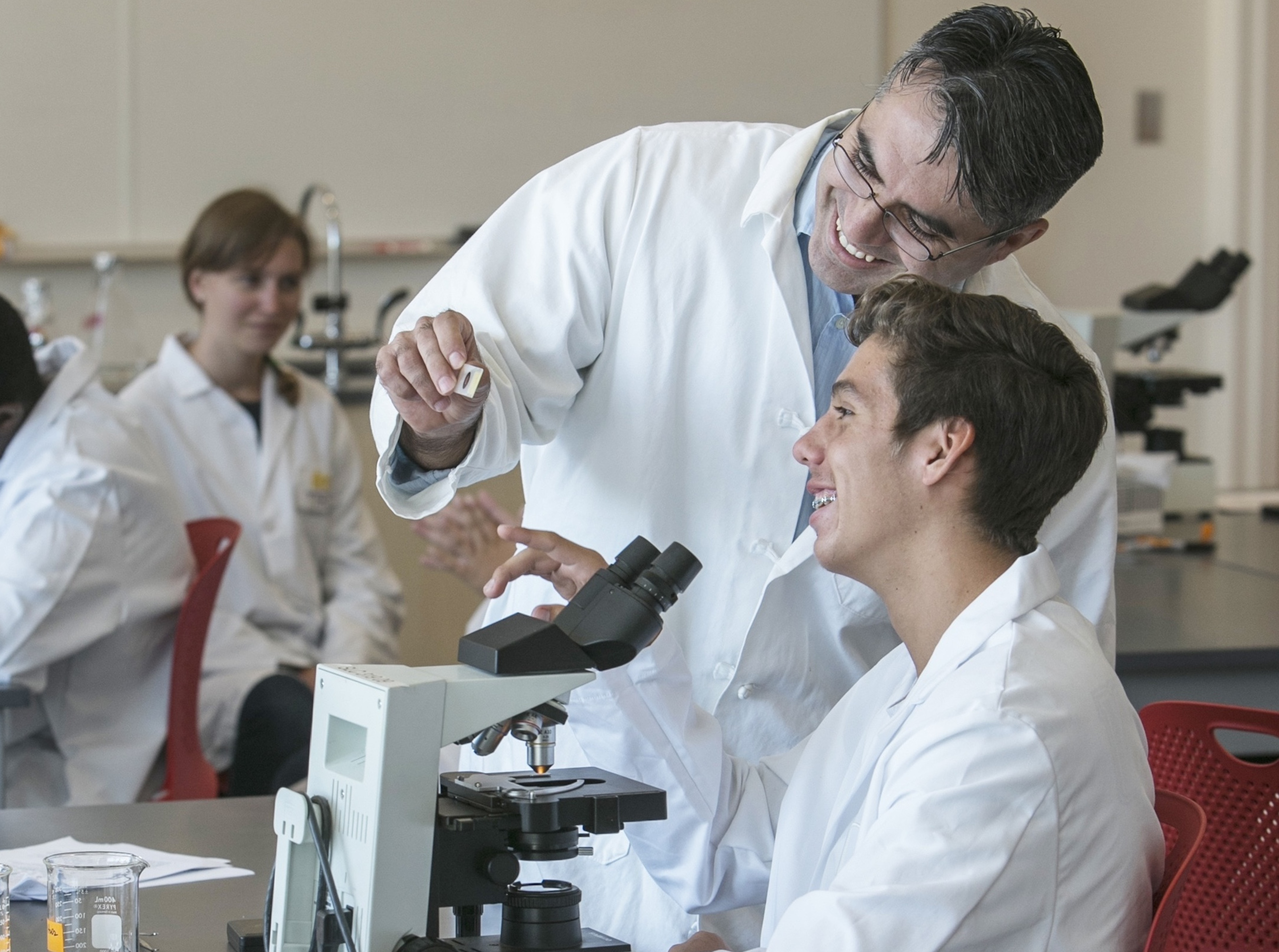 Professor and student in science lab