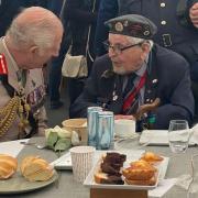 Alan McQuillin with the King discussing the RAF Servicing Commandos