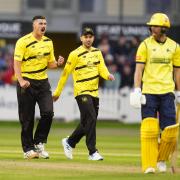 Gloucestershire's Marchant de Lange celebrates taking the wicket of Hampshire's Joe Weatherley during the Vitality Blast T20 match