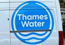 A logo for Thames Water on a van