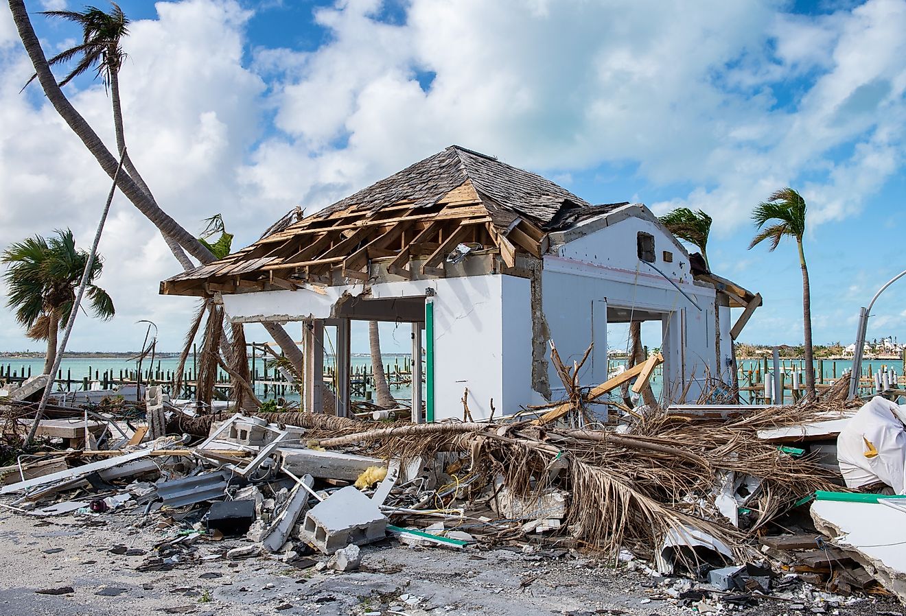 Destruction from hurricane Dorian showing debris and structural damage to buildings and trees. Image credit Paul Dempsey via Shutterstock