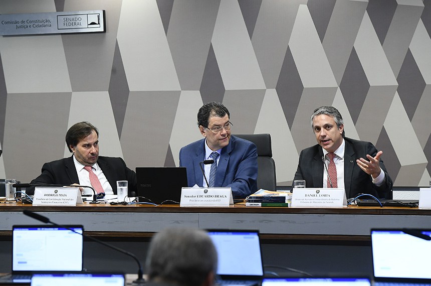 Mesa: 
presidente da Confederação Nacional das Instituições Financeiras (CNF), Rodrigo Maia; 
presidente em exercício da CCJ, senador Eduardo Braga (MDB-AM); 
diretor da Secretaria Extraordinária da Reforma Tributária do Ministério da Fazenda, Daniel Loria, em pronunciamento.