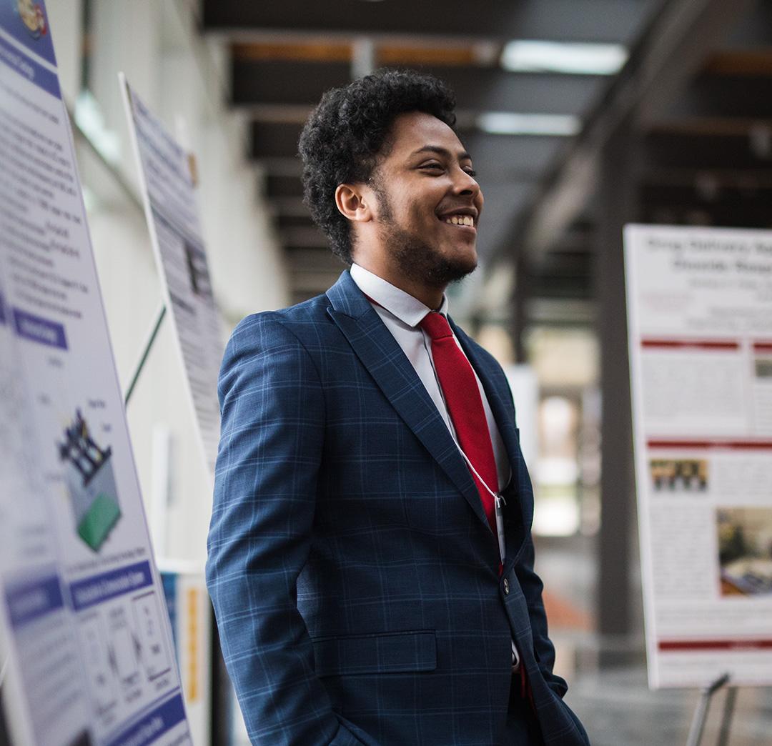 Student in suit and tie