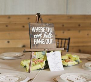 Kids table wedding centrepiece ideas sign where the cool kids hang out