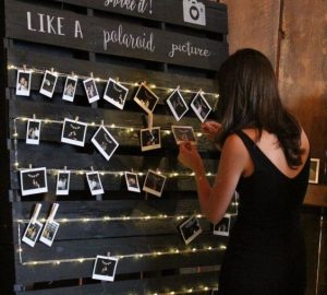 barn wedding photo display on pallets