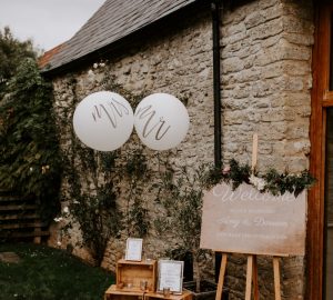 welcome wedding sign with balloons