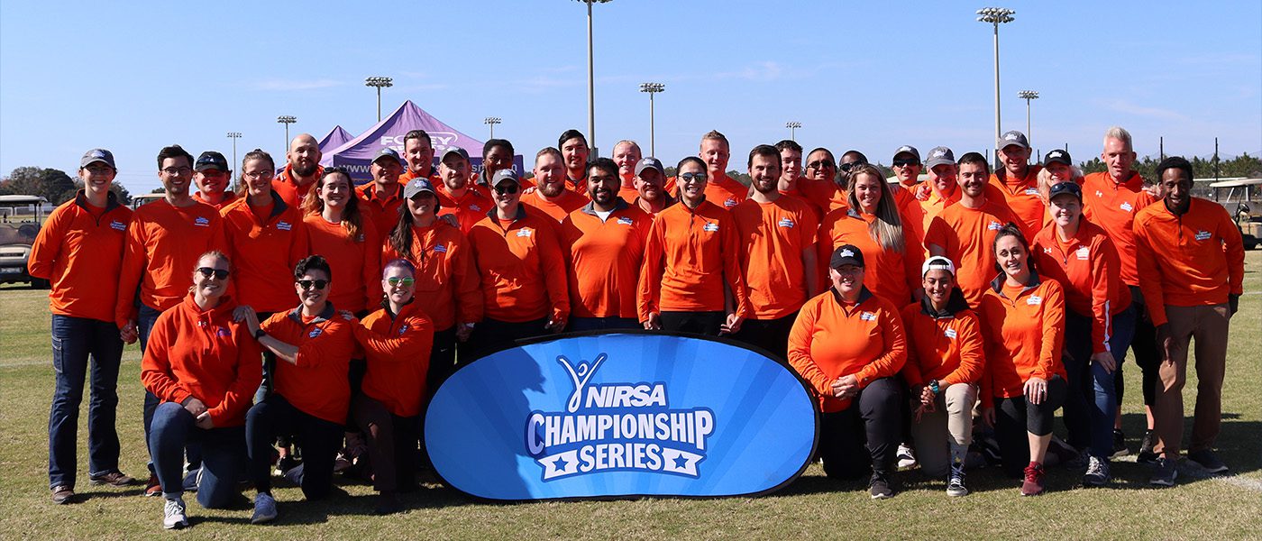 soccer volunteers lined up behind NIRSA banner