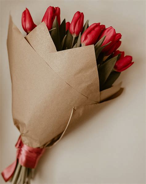 Download Delightful Bouquet of Fresh Red Tulips Wallpaper | Wallpapers.com