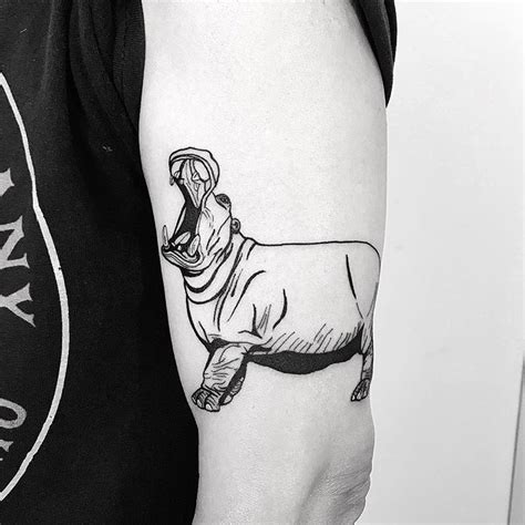 Hippo tattoo on the arm - Tattoogrid.net