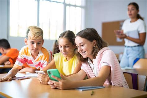 Group of Kids Using Smartphones during Lesson in School Stock Image - Image of gadget, elearning ...