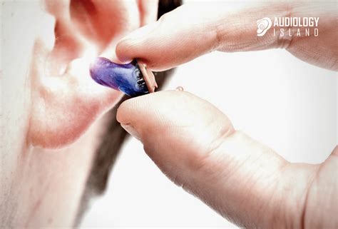 Forget about bulky devices with invisible hearing aids - Audiology Island