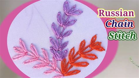 the embroidery pattern is made with different colors and shapes, including red, purple, and orange