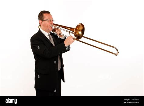 Tenor Trombone player in playing position Stock Photo - Alamy