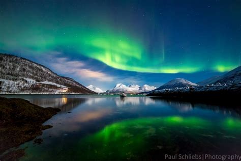 Northern Lights over the Fjords near Tromso Norway - Photorator