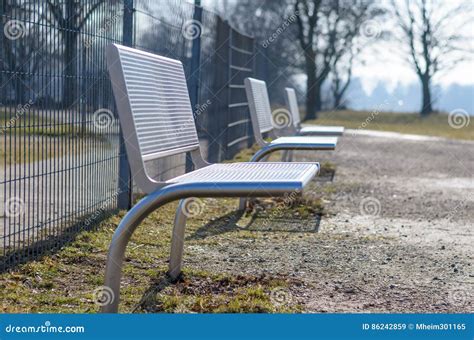 Modern Metal Benches in Park Stock Image - Image of park, curved: 86242859