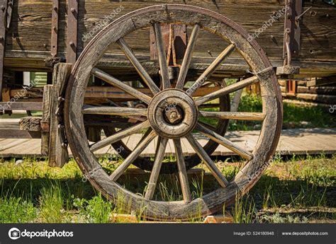 Old Vintage Weathered Wooden Wagon Wheel Wagon Stock Photo by ©paulbradyphoto 524180948