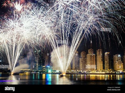 Fireworks display in Jumeirah Beach in Dubai Stock Photo - Alamy