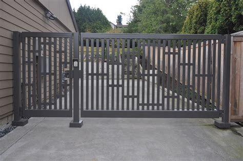 metal driveway gate with pedestrian access - atwelljonas