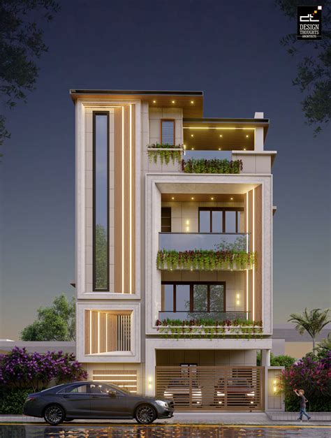 Modern Triplex house design with LED lights - Design Thoughts Architects