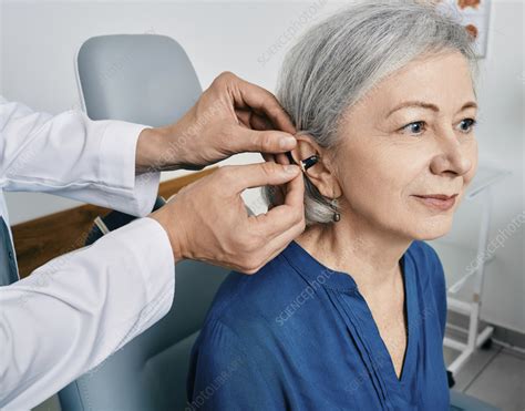 Intra-ear hearing aid fitting - Stock Image - F036/9273 - Science Photo Library