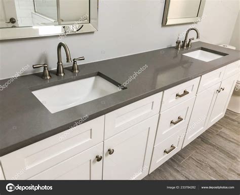 Bathroom Vanity White Cabinets Quartz Countertop White Rectangular Sinks Chrome Stock Photo by ...