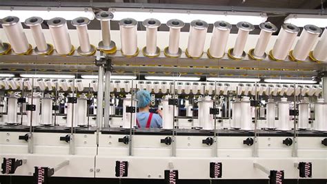 Cotton Yarn Production In A Textile Factory. Textile Fabric Manufacturing Machines In Work ...