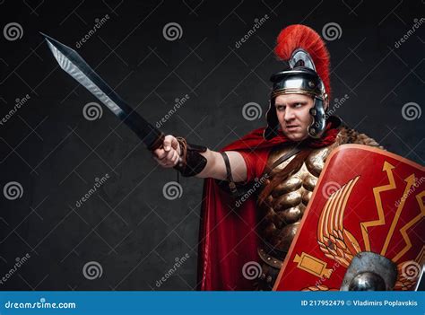 Angry Roman Soldier Points Sword Against Dark Background Stock Image - Image of soldier, holding ...