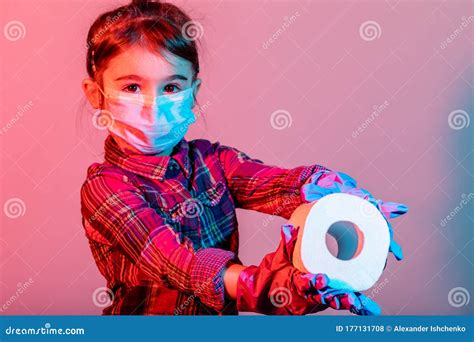 Little Girl with Fabric Mask in Color, Protect Herself from Coronavirus COVID-19 Stock Photo ...