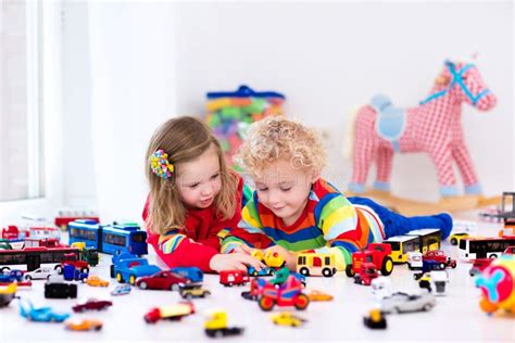 Little Kids Playing with Toy Cars Stock Photo - Image of drive, education: 74144890