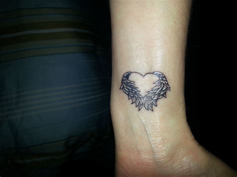 My Angel Heart tattoo in memory of all my angels. | Wing tattoos on wrist, Heart with wings ...