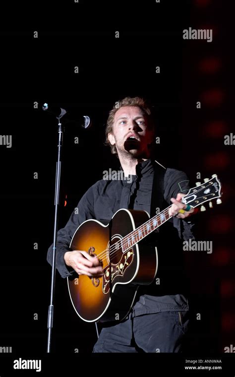 Chris Martin singer vocalist guitarist of Coldplay on Pyramid Stage at Glastonbury Festival of ...