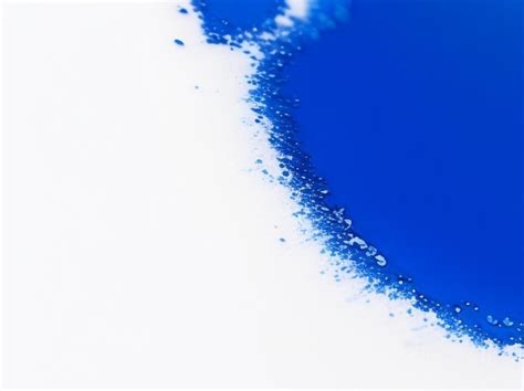 Premium AI Image | Sapphire Elegance Blue Paint Texture on White Canvas