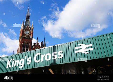 King's Cross Station Sign with St Pancras Station Clock Tower, Euston Road, London, England, UK ...