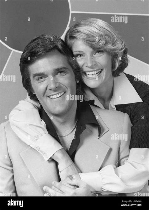 WHEEL OF FORTUNE, (from left): host Chuck Woolery, co-host Susan Stafford, (1976), 1975 Stock ...