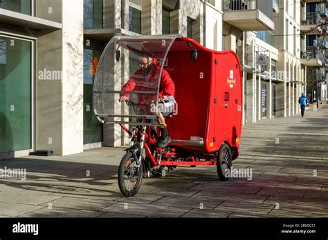 Postman bike post man mail hi-res stock photography and images - Alamy