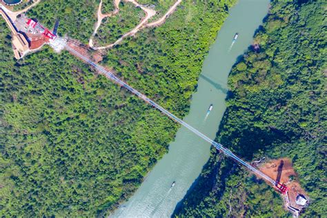 Glass Bridge in Huangchuan Three Gorges Scenic Area by The Architectural Design & Research ...