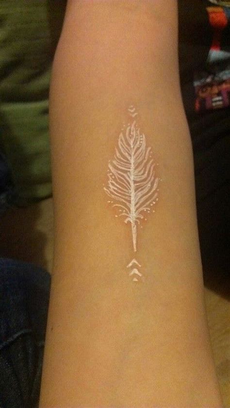 Cool white-ink-feather tattoo for women on arm. >> Find out more by clicking the photo | White ...