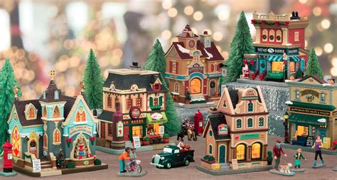 Complete christmas village decoration set to make a charming holiday town display