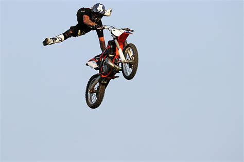 Dirt Bike Stunts - In The Air VIII Photograph by Debbie Oppermann