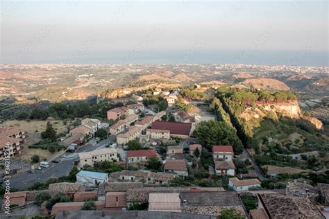 aerial view of Gerace, Calabria (Italy) at the sunset on a hill. A south italian village. it is ...