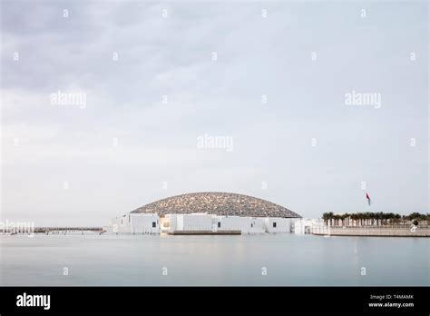 SAADIYAT ISLAND, ABU DHABI, UNITED ARAB EMIRATES - April 10, 2019: The Louvre Abu Dhabi on ...